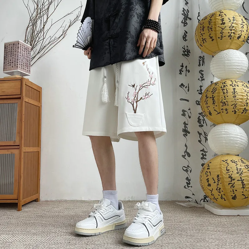 Men's Plum Blossom Embroidered Shorts Summer Loose Fit Casual 5-Point Pants Elastic Waist Tassel Drawstring Breathable Bottoms
Men's Plum Blossom Embroidered Shorts Summer Loose Fit Casual 5-Point Pants Elastic Waist Tassel Drawstring Breathable Bottoms