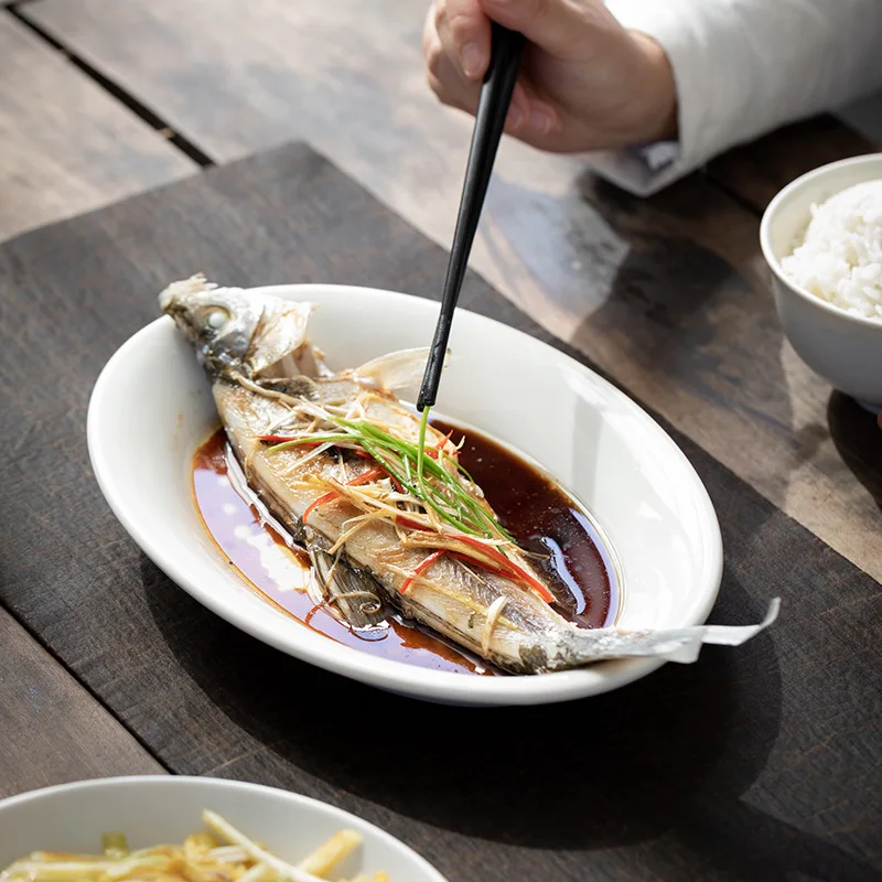 White Ceramic Oval Deep Platter 10.2in, Practical Tableware for Whole Steamed Fish, Hot Meals, Fruits and Assorted Snacks
White Ceramic Oval Deep Platter 10.2in, Practical Tableware for Whole Steamed Fish, Hot Meals, Fruits and Assorted Snacks