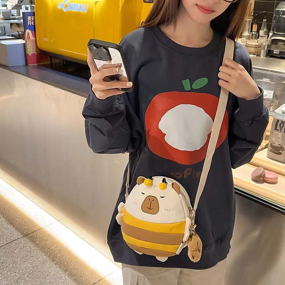 Plush Doll Pendant Capybara Nylon Bag Large Capacity Anti-splash Water Cartoon Shoulder Pouch Pink Bee Creative Crossbody Bag
Plush Doll Pendant Capybara Nylon Bag Large Capacity Anti-splash Water Cartoon Shoulder Pouch Pink Bee Creative Crossbody Bag
