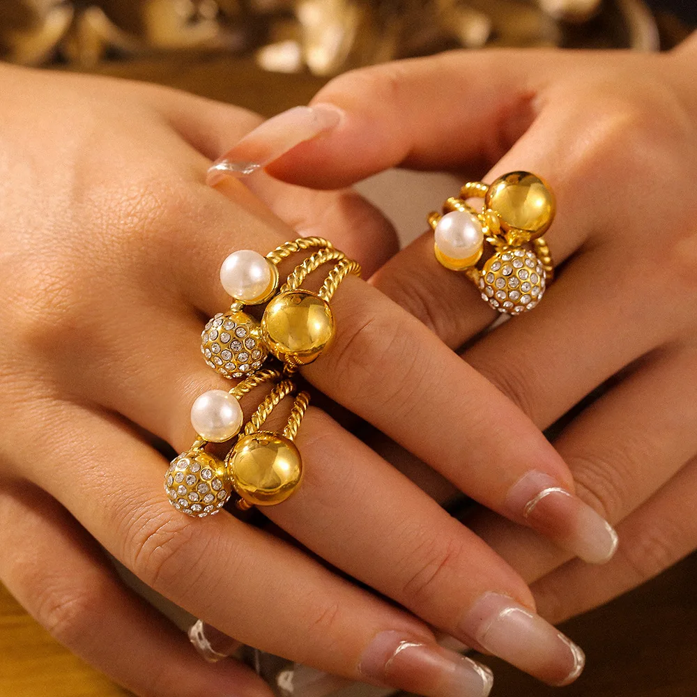 Элитное кольцо из титановой стали с жемчугом и бриллиантами, модный экстравагантный дизайн, позолоченное 8-каратным золотом, аксессуар для женщин
Элитное кольцо из титановой стали с жемчугом и бриллиантами, модный экстравагантный дизайн, позолоченное 8-каратным золотом, аксессуар для женщин
