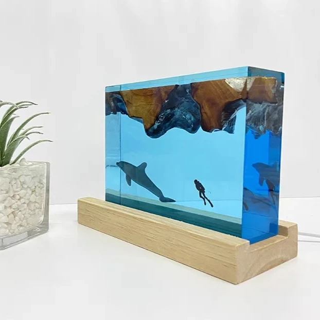 NEW Dolphin and Diver Creative Atmosphere Home Decoration Craft Resin Underwater World Lamp Decoration Piece Unique Gift
NEW Dolphin and Diver Creative Atmosphere Home Decoration Craft Resin Underwater World Lamp Decoration Piece Unique Gift