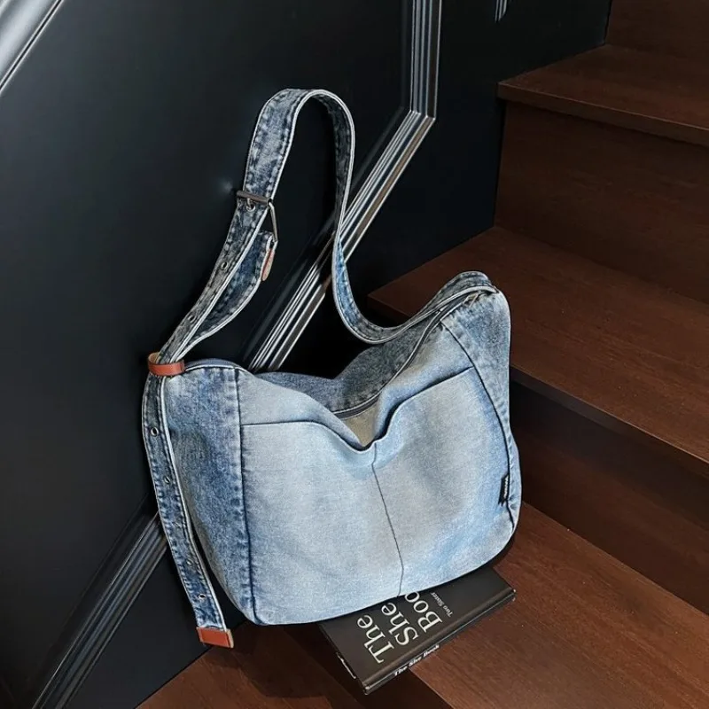 Винтажная вместительная сумка-кроссбоди из выстиранного денима, универсальная японская сумка через плечо для студентов и почтальонов
Винтажная вместительная сумка-кроссбоди из выстиранного денима, универсальная японская сумка через плечо для студентов и почтальонов