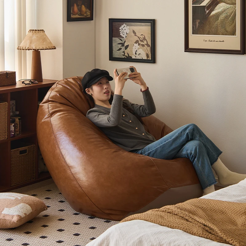 Modern style bean warehouse lazy sofa Ins tatami style bean bag leather chair set living room balcony sitting and sleeping
Modern style bean warehouse lazy sofa Ins tatami style bean bag leather chair set living room balcony sitting and sleeping