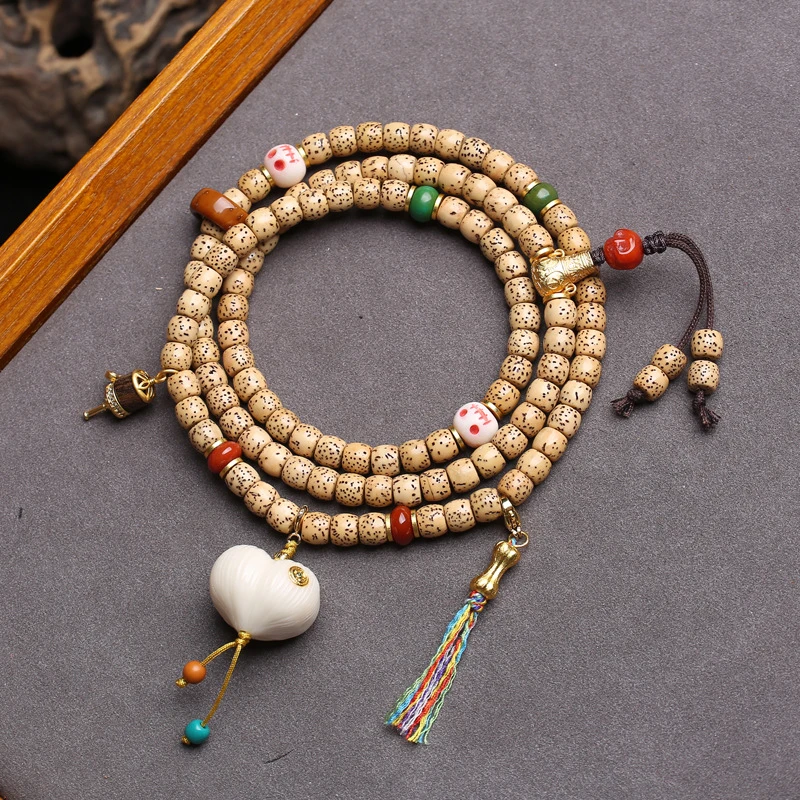 Natural Hainan Moon Bodhi 108 Buddha Tibetan Style Multi-loop Bracelet Beads
Natural Hainan Moon Bodhi 108 Buddha Tibetan Style Multi-loop Bracelet Beads