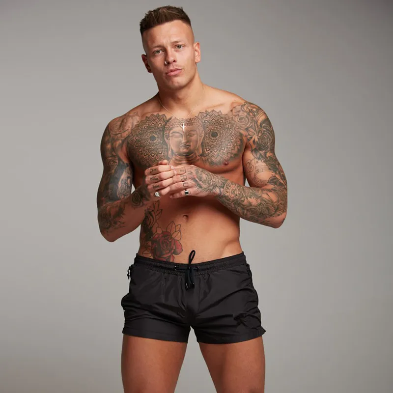 New Men's Casual Shorts Muscle Men Fitness Shorts Sports Running High Quality Beach Shorts Board Shorts for Male
New Men's Casual Shorts Muscle Men Fitness Shorts Sports Running High Quality Beach Shorts Board Shorts for Male