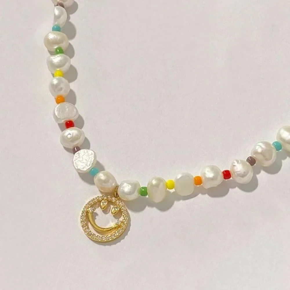 Trendy Rainbow Rice Beads Natural Freshwater Pearl Face Shape Pendant Choker Sweet Small Fresh Necklace Clavicle Chain for Women
Trendy Rainbow Rice Beads Natural Freshwater Pearl Face Shape Pendant Choker Sweet Small Fresh Necklace Clavicle Chain for Women