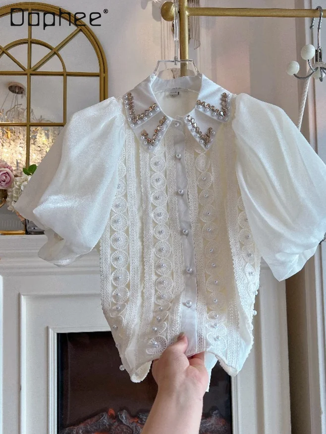 Korea Chic Heavy Industry Rhinestone Beaded Chiffon Shirt Women's Top 2026 Summer New Bubble Sleeves Loose Lapel Slim Shirts
Korea Chic Heavy Industry Rhinestone Beaded Chiffon Shirt Women's Top 2026 Summer New Bubble Sleeves Loose Lapel Slim Shirts