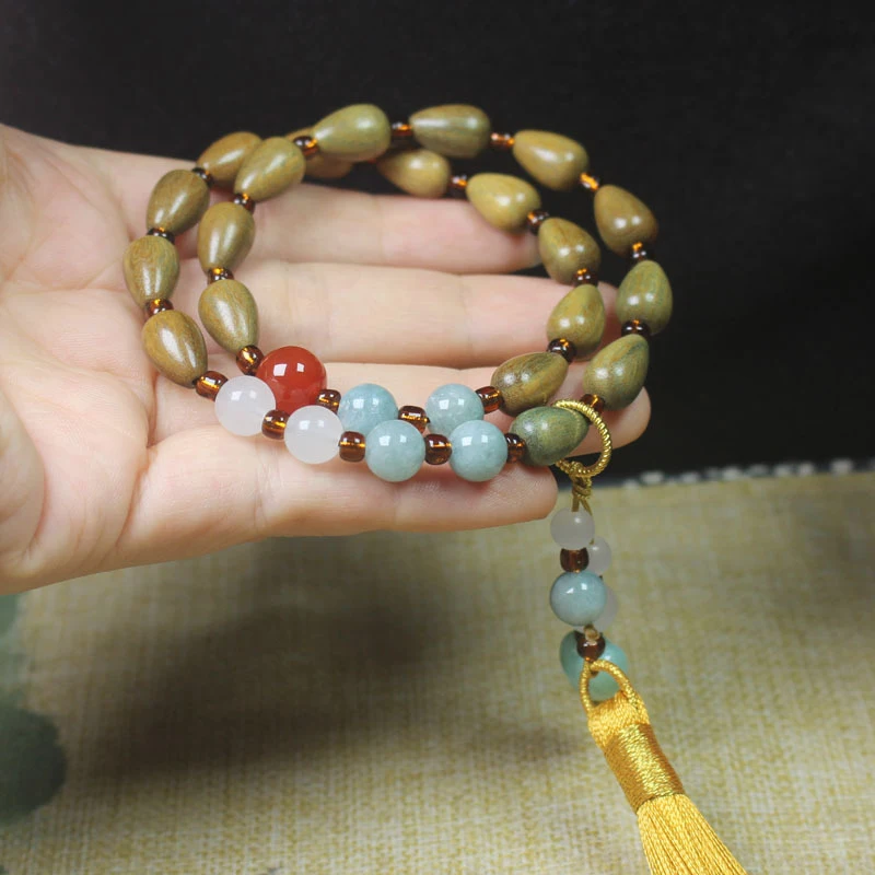 Green Sandalwood Water Drop Fragrant Double Circle Buddhist Bead Bracelet with Tassels, Simple Jewelry Gift for Men and Women
Green Sandalwood Water Drop Fragrant Double Circle Buddhist Bead Bracelet with Tassels, Simple Jewelry Gift for Men and Women