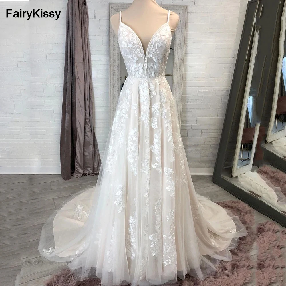 FairyKissy Elegant Champagne A-Line Lace Appliques Wedding Dress Sexy Deep V-Neck Spaghetti Straps Open Back Bridal Gowns
FairyKissy Elegant Champagne A-Line Lace Appliques Wedding Dress Sexy Deep V-Neck Spaghetti Straps Open Back Bridal Gowns