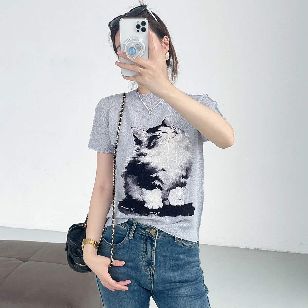 Miyake Style Pleated Top for Women 2025 Summer New Cartoon Niche Cat Pattern Print Casual Fashion Versatile T-shirt for Women
Miyake Style Pleated Top for Women 2025 Summer New Cartoon Niche Cat Pattern Print Casual Fashion Versatile T-shirt for Women
