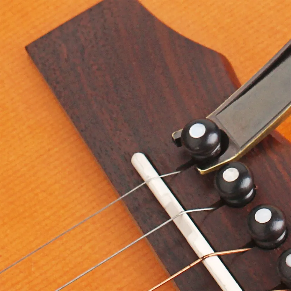 Каподастр-зажим для гитары, укулеле, мандолины, банджо, скрипки с профессиональной силиконовой накладкой
Каподастр-зажим для гитары, укулеле, мандолины, банджо, скрипки с профессиональной силиконовой накладкой