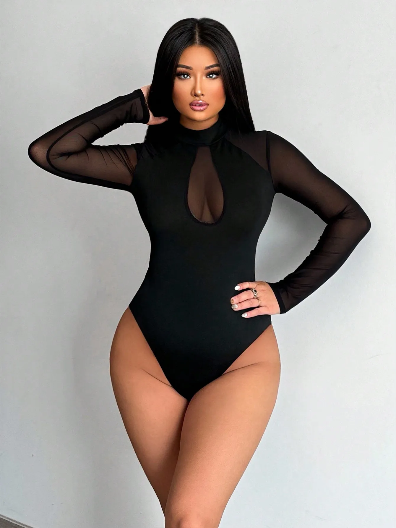 Black Sheer Mesh Long Sleeve Mock Neck Bodysuit with Keyhole Cutout
Black Sheer Mesh Long Sleeve Mock Neck Bodysuit with Keyhole Cutout