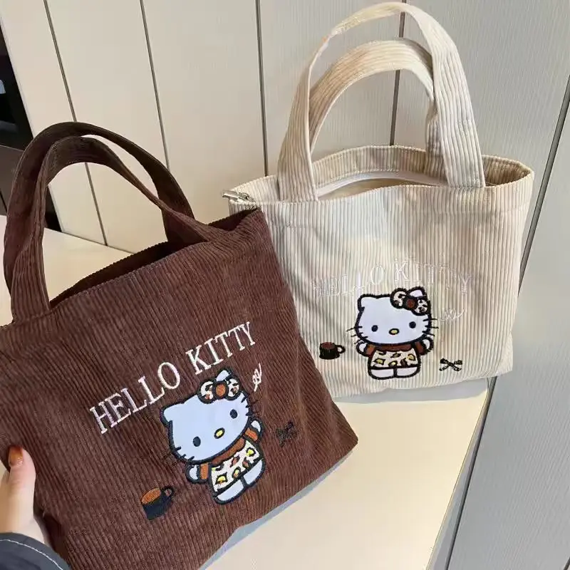 Kawaii Sanrio Hello Kitty Handbag Cute Embroidered Large-Capacity Handbag Corduroy Small Bag Students School Single Shoulder Bag
Kawaii Sanrio Hello Kitty Handbag Cute Embroidered Large-Capacity Handbag Corduroy Small Bag Students School Single Shoulder Bag