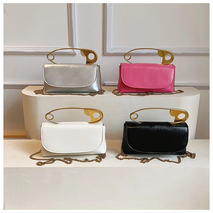 Unique Clip Small Bag Women's New Trendy Korean Version Versatile Messenger Bag Chain Portable Pin Bag
Unique Clip Small Bag Women's New Trendy Korean Version Versatile Messenger Bag Chain Portable Pin Bag