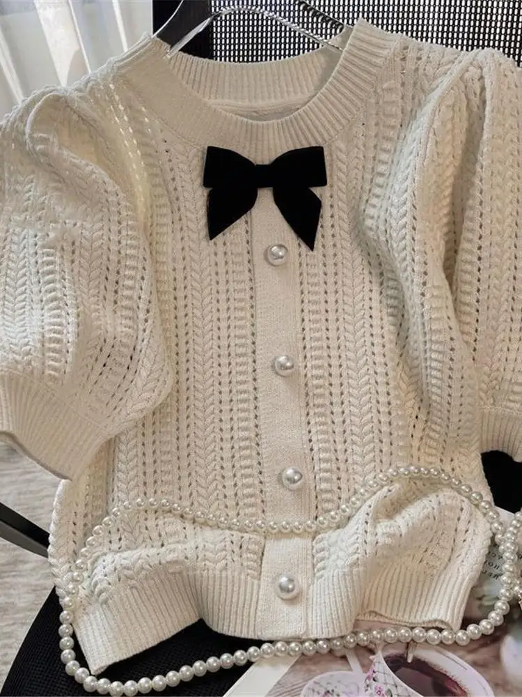Summer 2026 New Style Light Beige round Neck Bubble Sleeve Short Knitted Top Women's Fashion Knot Short Sleeve Shirt
Summer 2026 New Style Light Beige round Neck Bubble Sleeve Short Knitted Top Women's Fashion Knot Short Sleeve Shirt