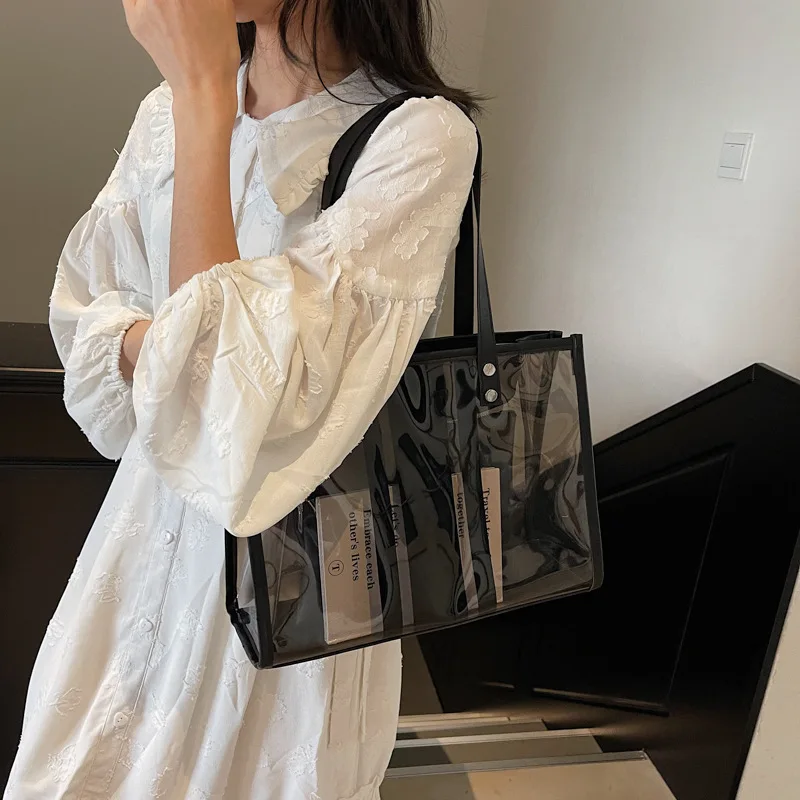 2025 New Transparent Jelly Bag for Women PVC Personalized Large Capacity Shoulder Bag Texture Travel Commuter Tote Bag
2025 New Transparent Jelly Bag for Women PVC Personalized Large Capacity Shoulder Bag Texture Travel Commuter Tote Bag