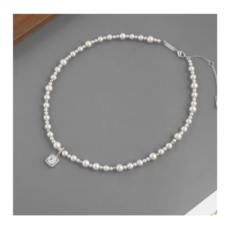 Hot Sale White Pearl Necklace High Sense Light Luxury Simple Sugar Cube Zircon Pendant Pearl Clavicle Chain
Hot Sale White Pearl Necklace High Sense Light Luxury Simple Sugar Cube Zircon Pendant Pearl Clavicle Chain