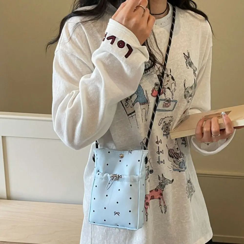 Casual Canvas Phone Bag Polka Dot Bow Print with Pearl Charm Shoulder Bag Drawstring Sling Bag Gift
Casual Canvas Phone Bag Polka Dot Bow Print with Pearl Charm Shoulder Bag Drawstring Sling Bag Gift