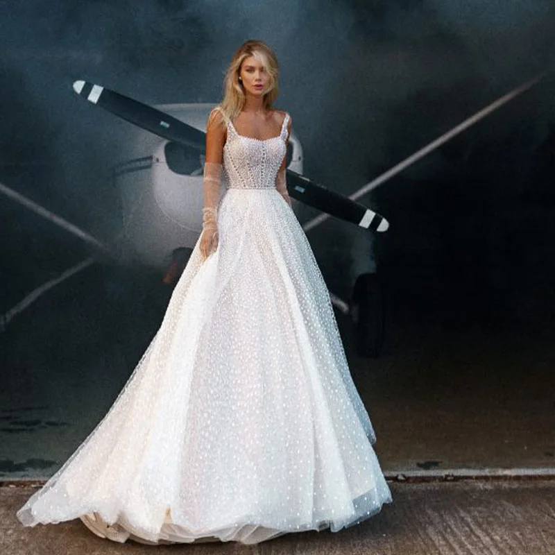 Customized Sweetheart Bead Spaghetti Straps A-Line Wedding Gown for Bride 2022 AppliquesChapel Train Bride Dresses
Customized Sweetheart Bead Spaghetti Straps A-Line Wedding Gown for Bride 2022 AppliquesChapel Train Bride Dresses