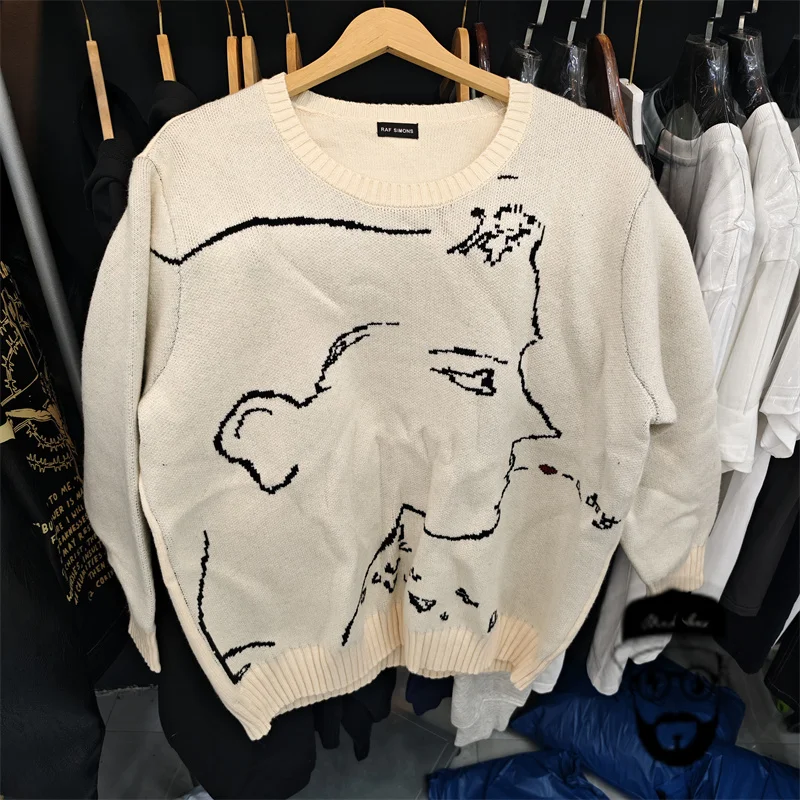 Beige outline RAF SIMONS round neck sweater for men and women in autumn and winter, knitted cedar
Beige outline RAF SIMONS round neck sweater for men and women in autumn and winter, knitted cedar