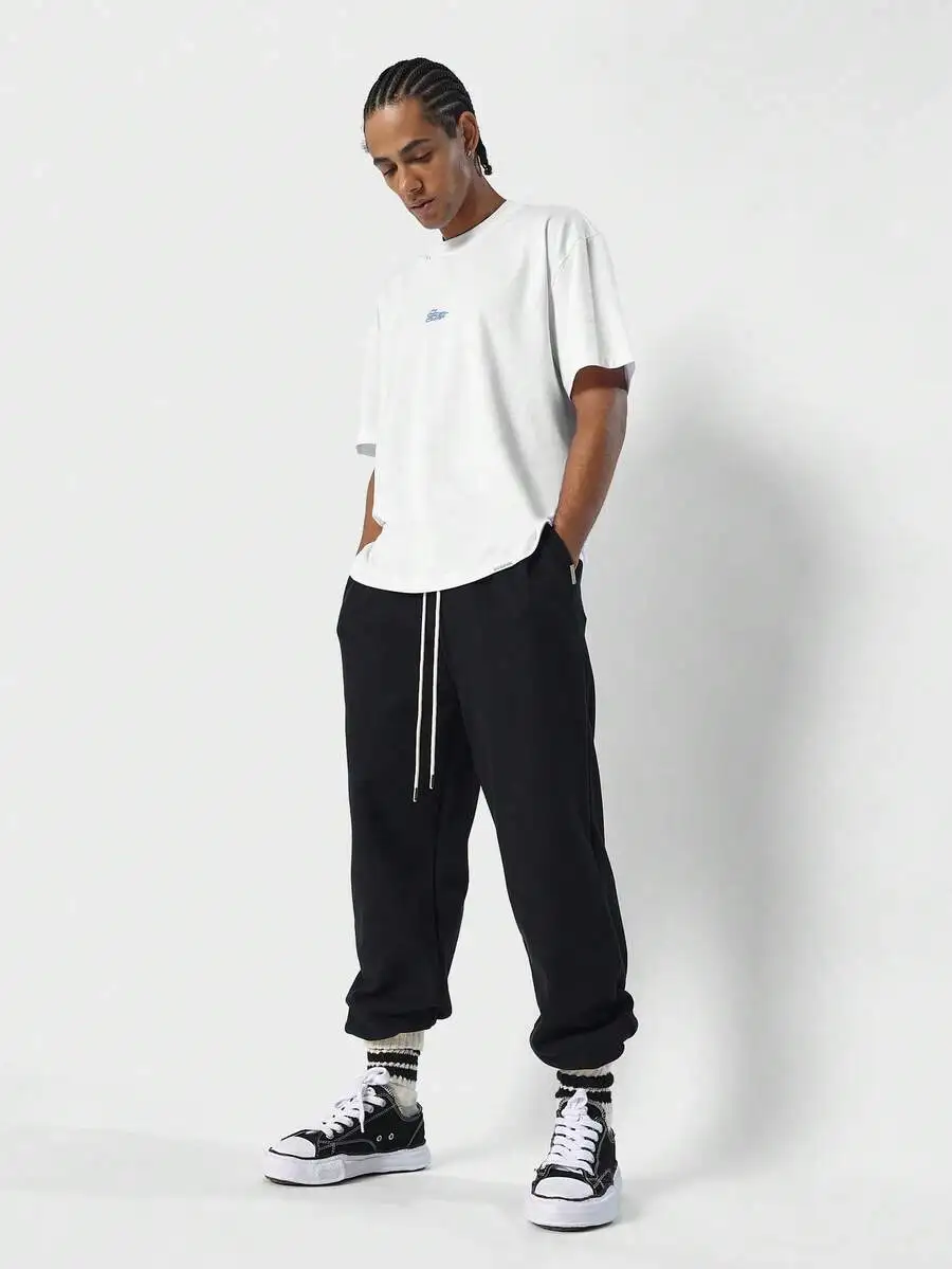 White Casual T-Shirt With Small Front Logo Print
White Casual T-Shirt With Small Front Logo Print