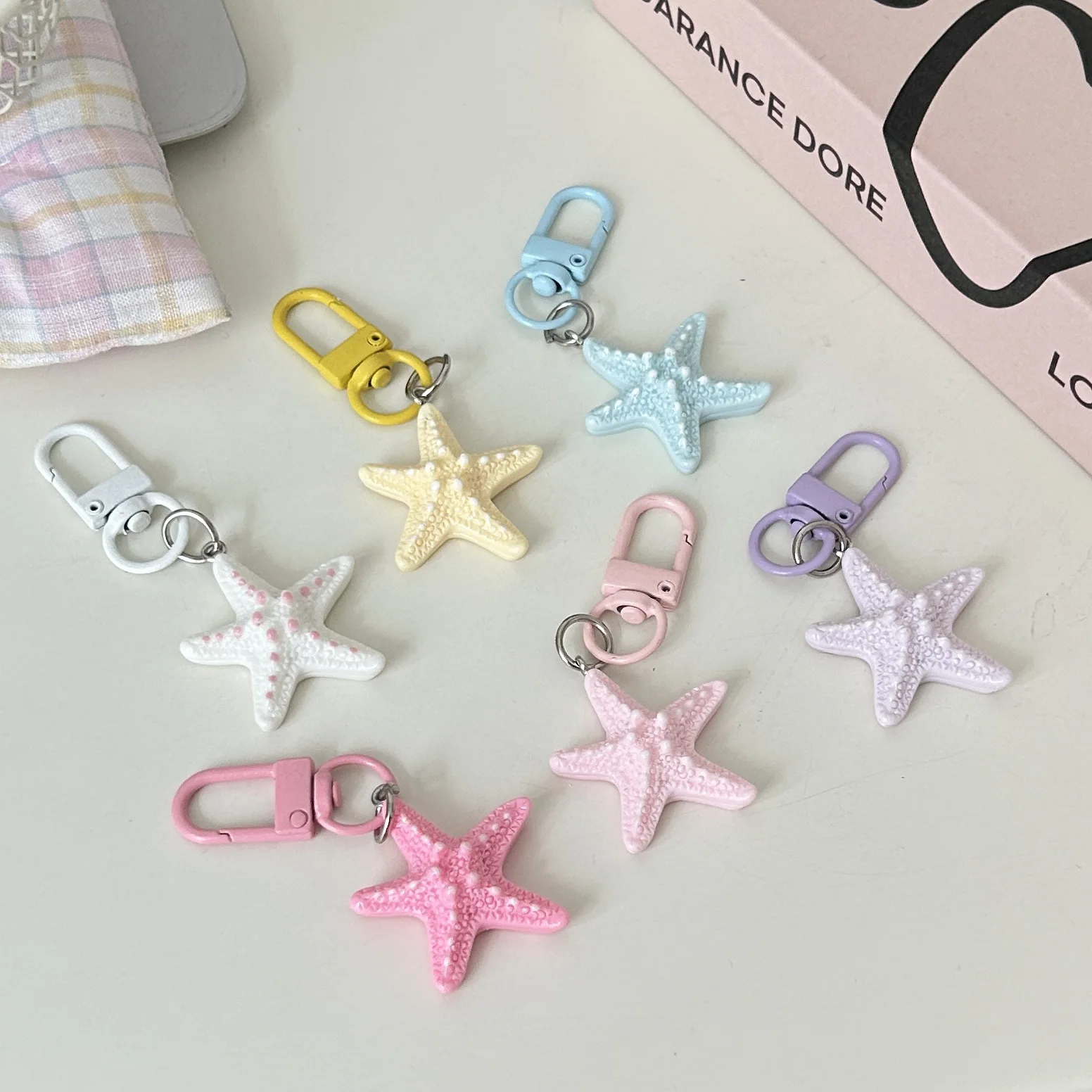 Cute Starfish Pendant Keychain Colorful Ocean Style Charm Pendant Sweet Macaron Color Decorative Gifts suitable for friends
Cute Starfish Pendant Keychain Colorful Ocean Style Charm Pendant Sweet Macaron Color Decorative Gifts suitable for friends