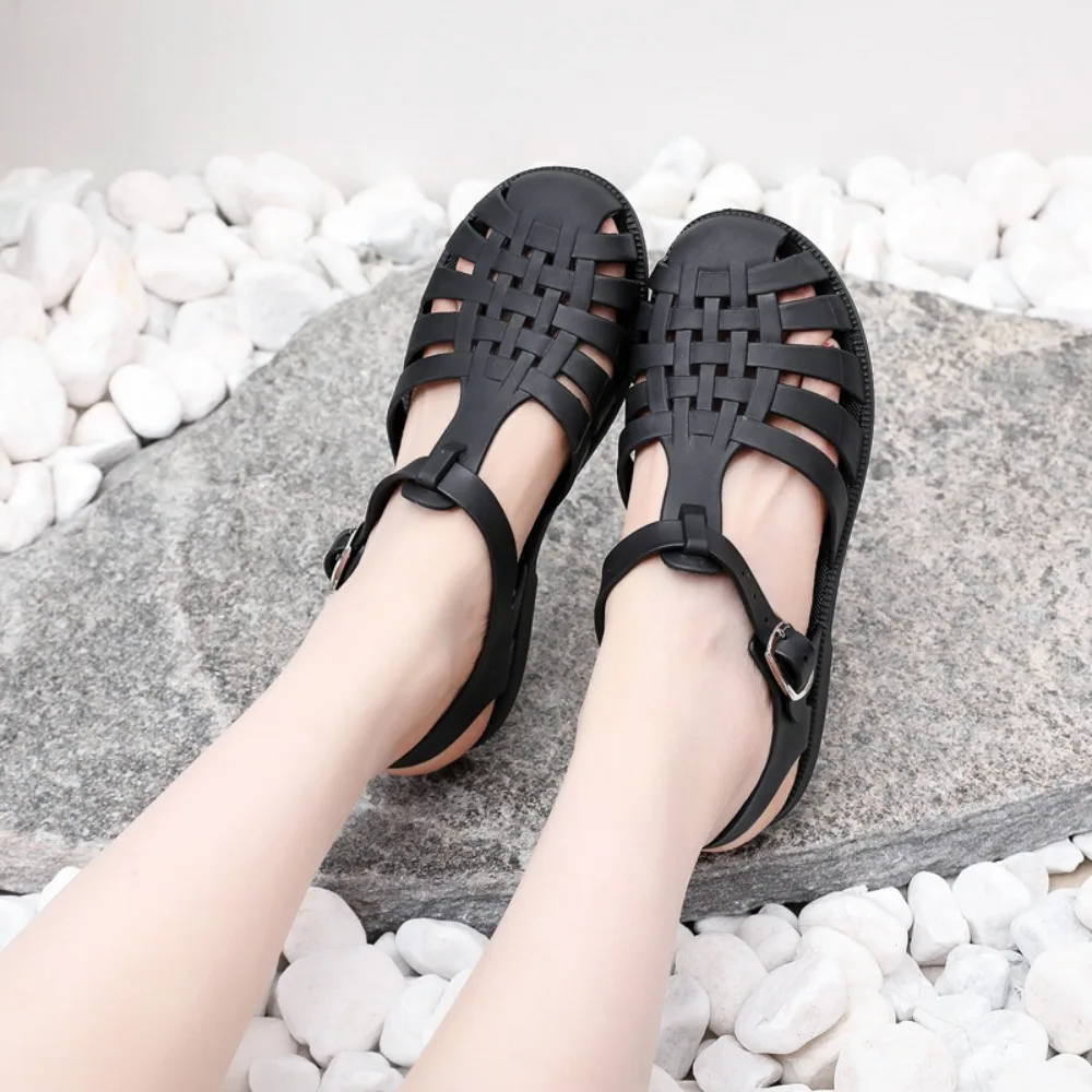 Casual PVC Summer Roman Sandals Soft Sole Non-slip Roman Jelly Sandals Comfortable Flat Round Toe Hollow Out Shoes Beach
Casual PVC Summer Roman Sandals Soft Sole Non-slip Roman Jelly Sandals Comfortable Flat Round Toe Hollow Out Shoes Beach