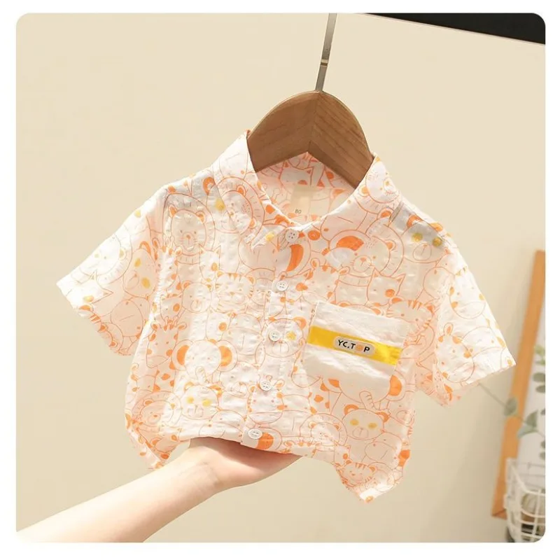 Children's Clothing Boys Short Sleeved Shirt 2024 New Turn Down Collar Button Print Pocket Fashion Casual Short Sleeved Tops
Children's Clothing Boys Short Sleeved Shirt 2024 New Turn Down Collar Button Print Pocket Fashion Casual Short Sleeved Tops