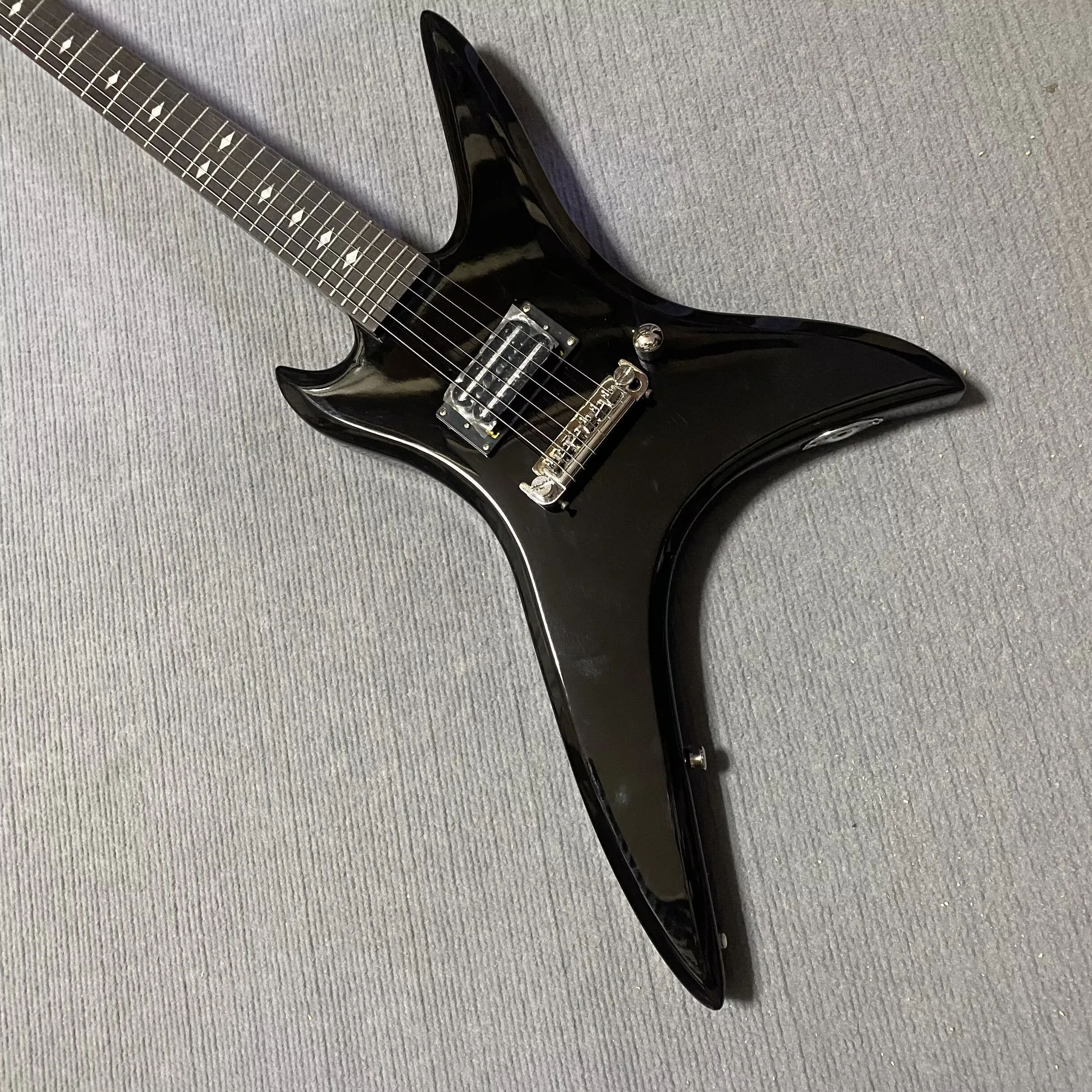 Realistic shooting of a bright black guitar Real photo, in stock. Rock electric guitar. 48-hour fast delivery.
Realistic shooting of a bright black guitar Real photo, in stock. Rock electric guitar. 48-hour fast delivery.