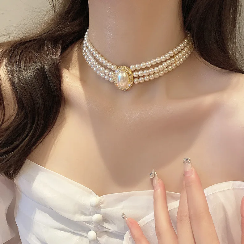 Multi-layer pearl crystal necklace collar collarbone chain design sense Internet celebrity water crystal short necklace collar
Multi-layer pearl crystal necklace collar collarbone chain design sense Internet celebrity water crystal short necklace collar