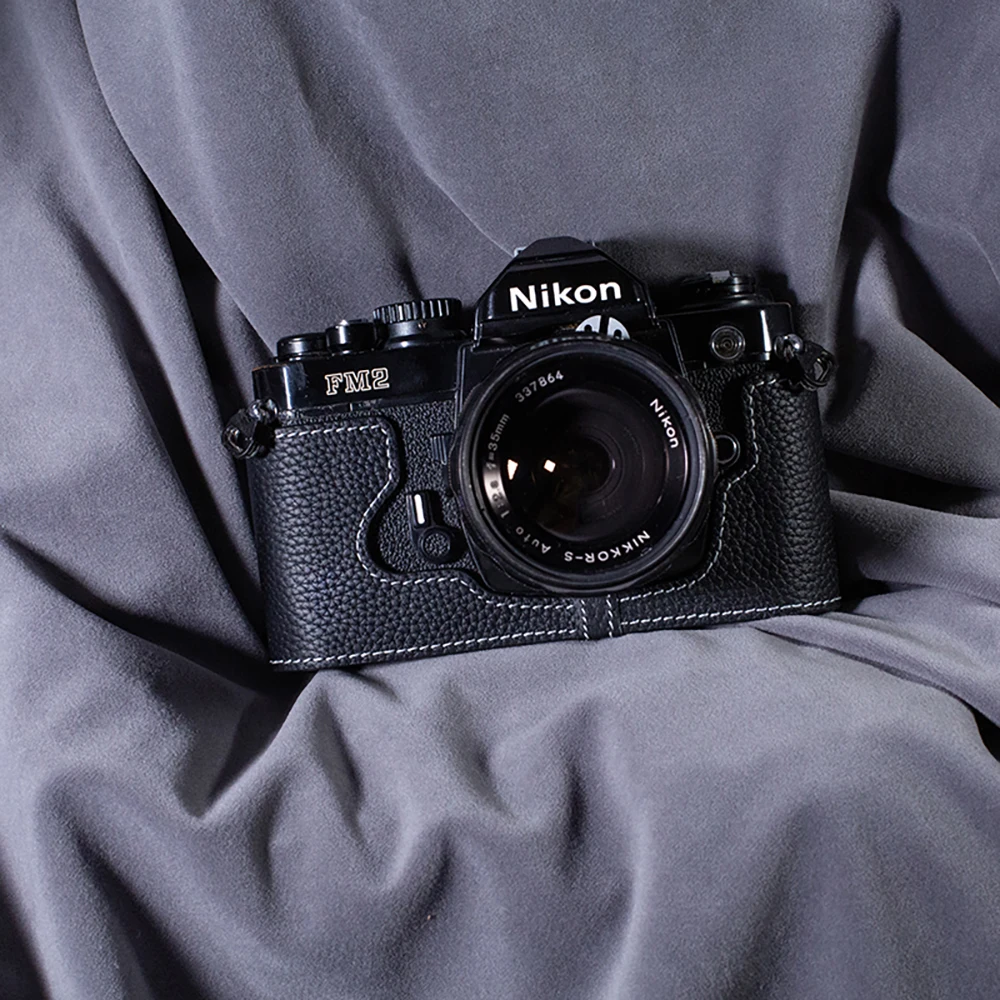 For Nikon F3 FE2 F3AF F3TF F3HP DF FM2 Case Genuine Leather DF Half Case FM2 Half Bag Handmade Camera Bag F3 Protective Case 
For Nikon F3 FE2 F3AF F3TF F3HP DF FM2 Case Genuine Leather DF Half Case FM2 Half Bag Handmade Camera Bag F3 Protective Case