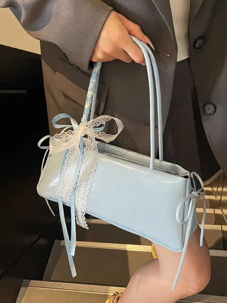 Korean Edition Bow Ribbon Lace Shoulder Bag Women Summer New Style Simple Girl Sweet Commuter Versatile Underarm Handheld Bag
Korean Edition Bow Ribbon Lace Shoulder Bag Women Summer New Style Simple Girl Sweet Commuter Versatile Underarm Handheld Bag