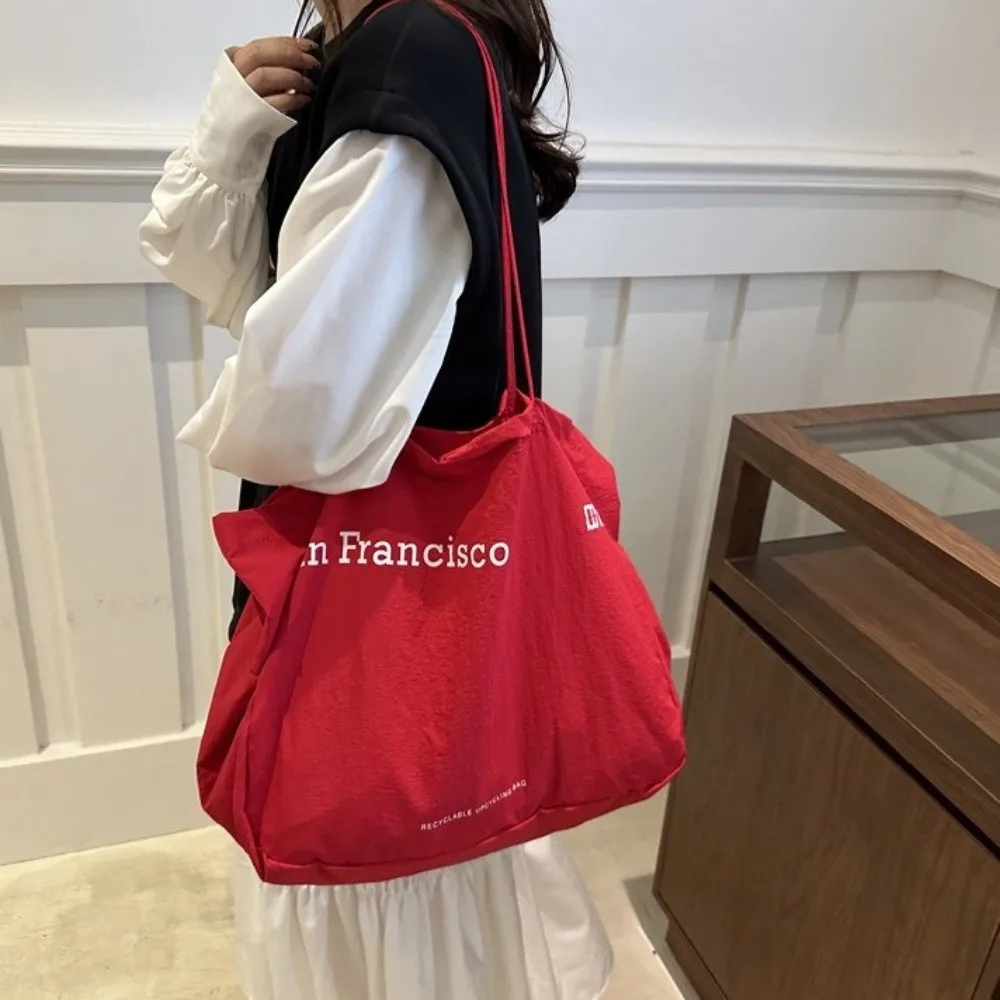 Durable Large Capacity Canvas Shoulder Bag Solid Color Letter Print Tote Bag Street Style Shopping Bag School Handbag School Use
Durable Large Capacity Canvas Shoulder Bag Solid Color Letter Print Tote Bag Street Style Shopping Bag School Handbag School Use