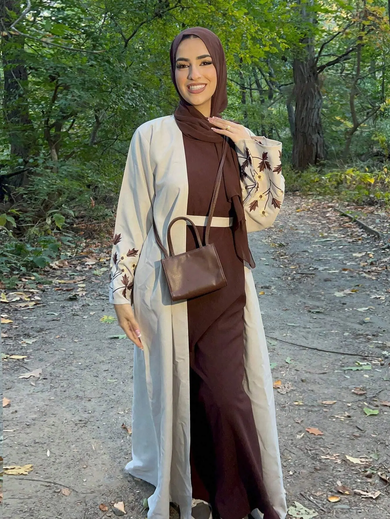 Muslim Women's Two Tone Islamic Abaya with Leaf - Embroidery on Sleeves Ideal for Nature Inspired Modest Fashion in Middle East
Muslim Women's Two Tone Islamic Abaya with Leaf - Embroidery on Sleeves Ideal for Nature Inspired Modest Fashion in Middle East