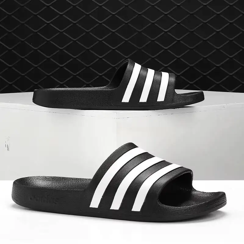 Adidas 2026 Trendy Slides, Classic Striped Black White Beach Shower Casual Sandals F35543
Adidas 2026 Trendy Slides, Classic Striped Black White Beach Shower Casual Sandals F35543