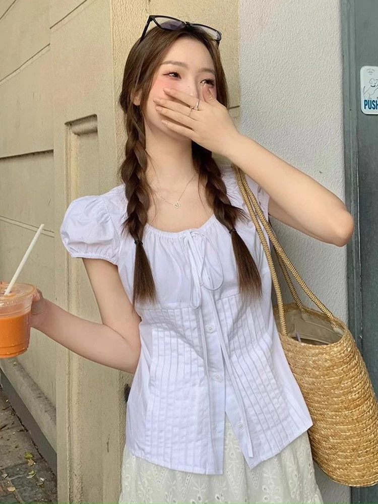 Zoki Summer Puffy Sleeve Shirt Women Sweet Cute Slim White Blouse Korean Preppy Style Casual Fashion Lace Up Design Kawaii Tops
Zoki Summer Puffy Sleeve Shirt Women Sweet Cute Slim White Blouse Korean Preppy Style Casual Fashion Lace Up Design Kawaii Tops