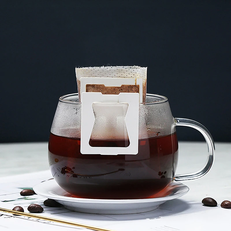 50Pcs Disposable Coffee Fliter Bags Portable Hanging Ear Style Coffee Filters
50Pcs Disposable Coffee Fliter Bags Portable Hanging Ear Style Coffee Filters