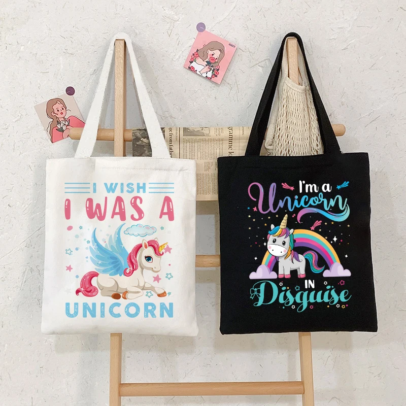 Cartoon unicorn design, student black canvas handbag, large capacity commuting shopping beige single shoulder canvas bag
Cartoon unicorn design, student black canvas handbag, large capacity commuting shopping beige single shoulder canvas bag