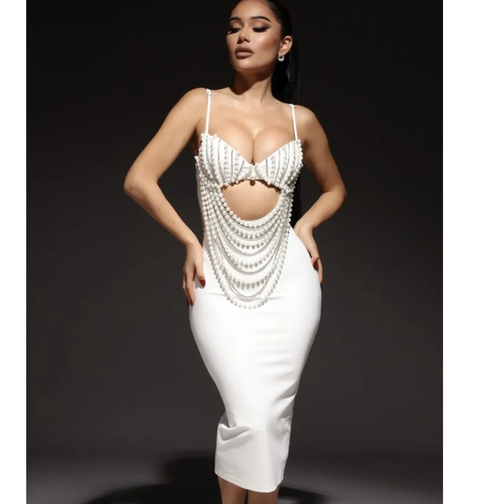 2024 New Bandage Fashionable Sexy Summer Black And White Hanging Strap Hollow Chain Banquet Party Dress
2024 New Bandage Fashionable Sexy Summer Black And White Hanging Strap Hollow Chain Banquet Party Dress