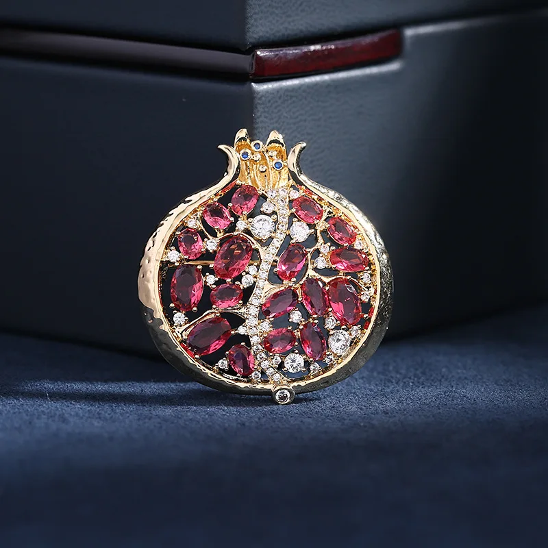 New Luxury High-End Winter Coat Accessory Creative Design Red Zircon Inlaid Pomegranate Brooch
New Luxury High-End Winter Coat Accessory Creative Design Red Zircon Inlaid Pomegranate Brooch