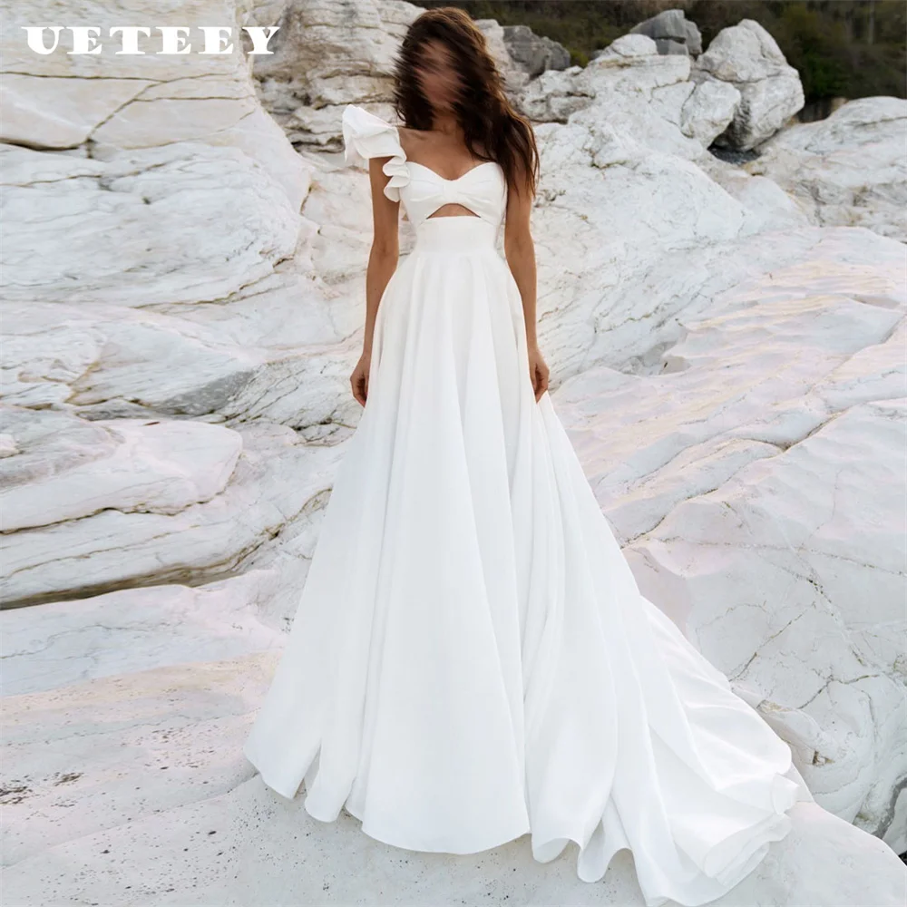 UETEEY Customized Asymmetrical One Shoulder Crepe A Line Wedding Dress Women Simple Zipper Back Cut Out Court Train Bridal Gown
UETEEY Customized Asymmetrical One Shoulder Crepe A Line Wedding Dress Women Simple Zipper Back Cut Out Court Train Bridal Gown