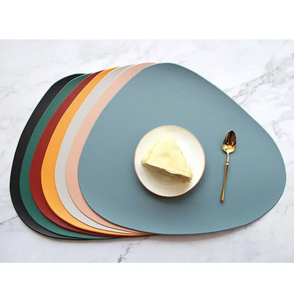 Household waterproof and oil proof dining table mat, restaurant cup mat, triangular insulated tableware mat Table mat European
Household waterproof and oil proof dining table mat, restaurant cup mat, triangular insulated tableware mat Table mat European