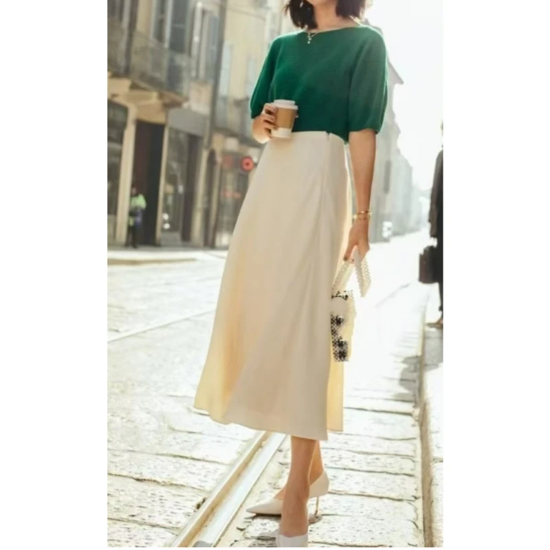 25 year old classic European and American style solid color hanging high waist mid length skirt
25 year old classic European and American style solid color hanging high waist mid length skirt