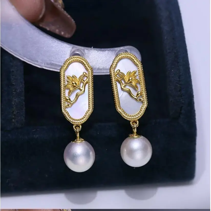 Elegant Pair of South Sea 10-11mm White Round Pearl Dangle Earring 925s
Elegant Pair of South Sea 10-11mm White Round Pearl Dangle Earring 925s