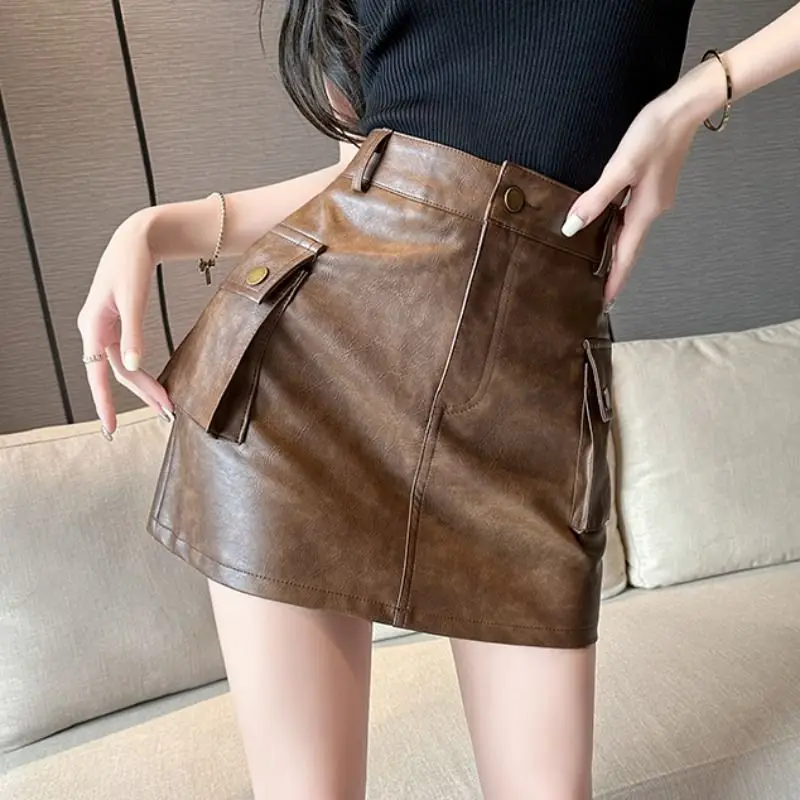 Maillard Style Coffee PU A-line Short Skirts Side Big Pockets Slim Hips Mini Leather Skirts
Maillard Style Coffee PU A-line Short Skirts Side Big Pockets Slim Hips Mini Leather Skirts