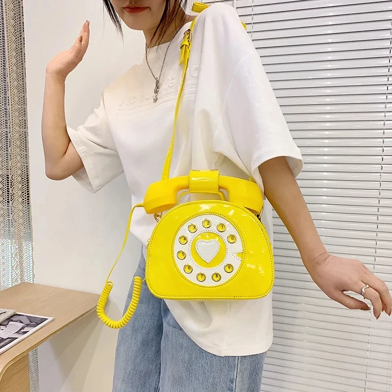 Women's creative shoulder bag - phone-shaped cross-body bag - made of vintage PU leather - designer style - European and America
Women's creative shoulder bag - phone-shaped cross-body bag - made of vintage PU leather - designer style - European and America