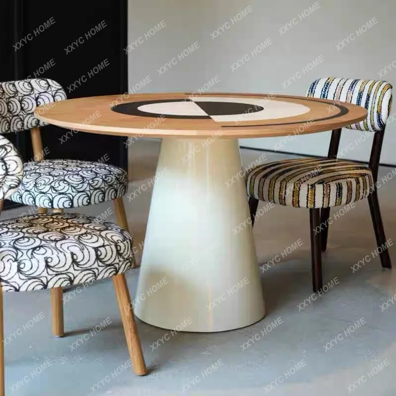 Simple modern dining table art color matching round dining table
Simple modern dining table art color matching round dining table