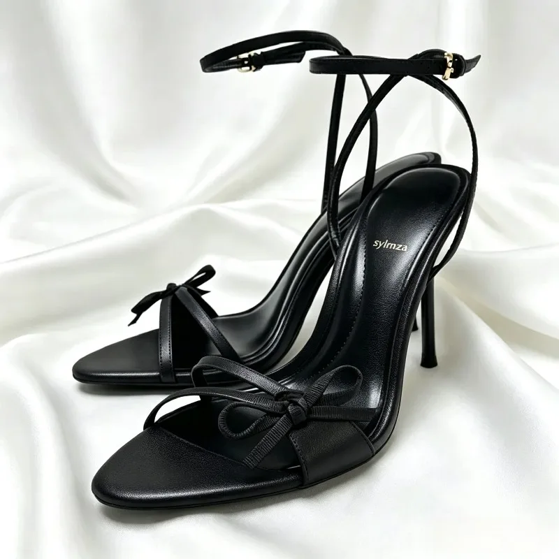 Black Satin Narrow-band Heeled Sandals Women Fashion Bow Detail Ankle-strap Buckle Heels Elegant Party Dress Shoes Zapatos Mujer
Black Satin Narrow-band Heeled Sandals Women Fashion Bow Detail Ankle-strap Buckle Heels Elegant Party Dress Shoes Zapatos Mujer