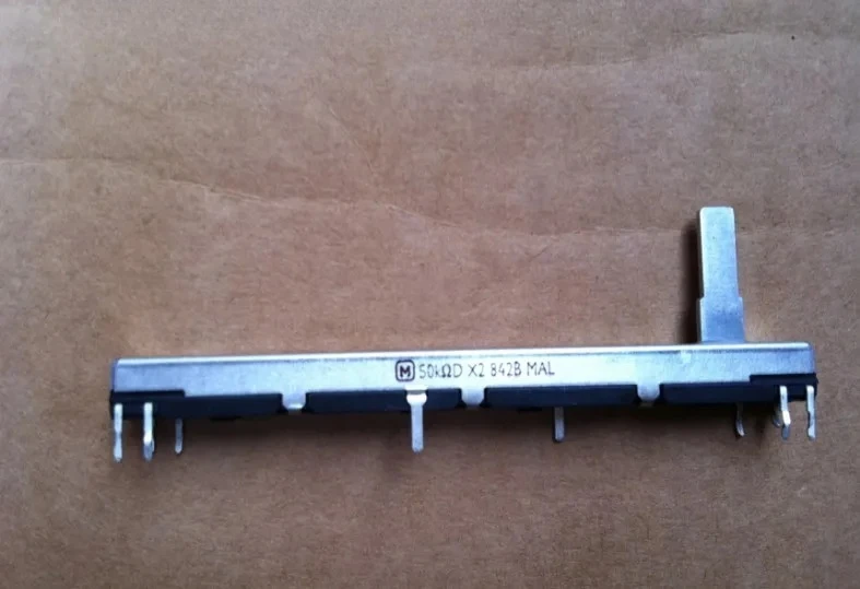 7.5cm slide potentiometer duplex 50KD*2 axis long 15MM mixer fader potentiometer
7.5cm slide potentiometer duplex 50KD*2 axis long 15MM mixer fader potentiometer