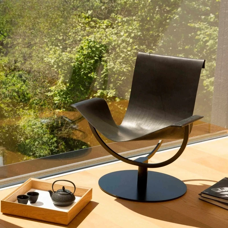 Creative leather single chair, villa living room home, simple backrest leisure chair
Creative leather single chair, villa living room home, simple backrest leisure chair